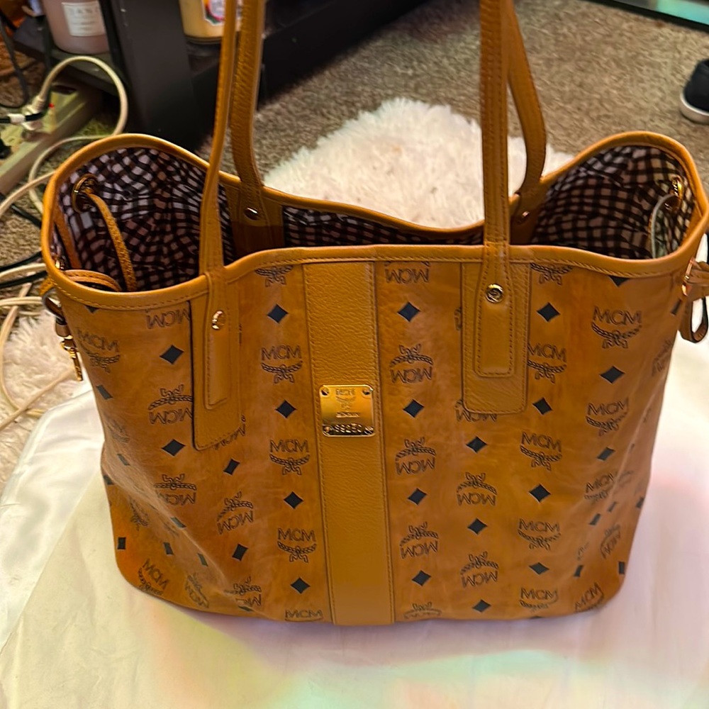 AUTHENTIC…. MCM medium size tote bag. no damage, marks or scratches. Like New!